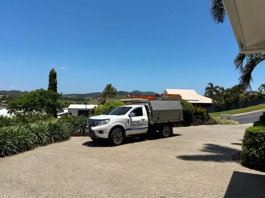 The branded Infuse Electrical service ute parked on a Mackay residential street